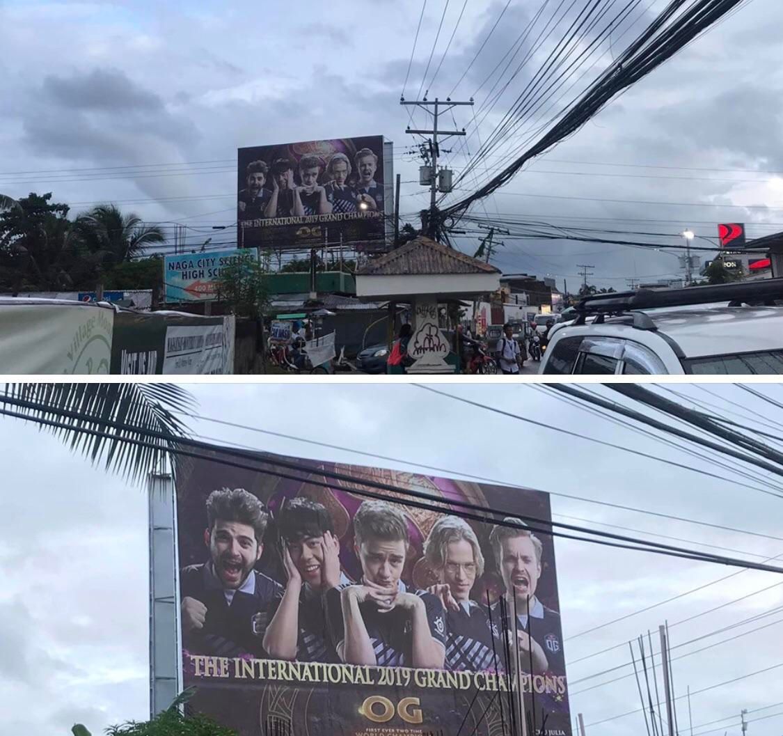 Билборд с плакатом в честь победы OG на The International 2019 | Фото: страница Чу Джулиа в Facebook
